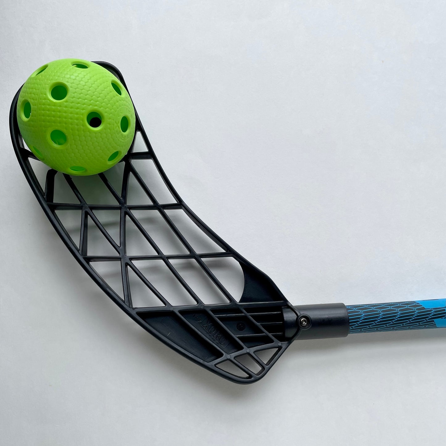 Hockeyball blue stick with ball topdown view