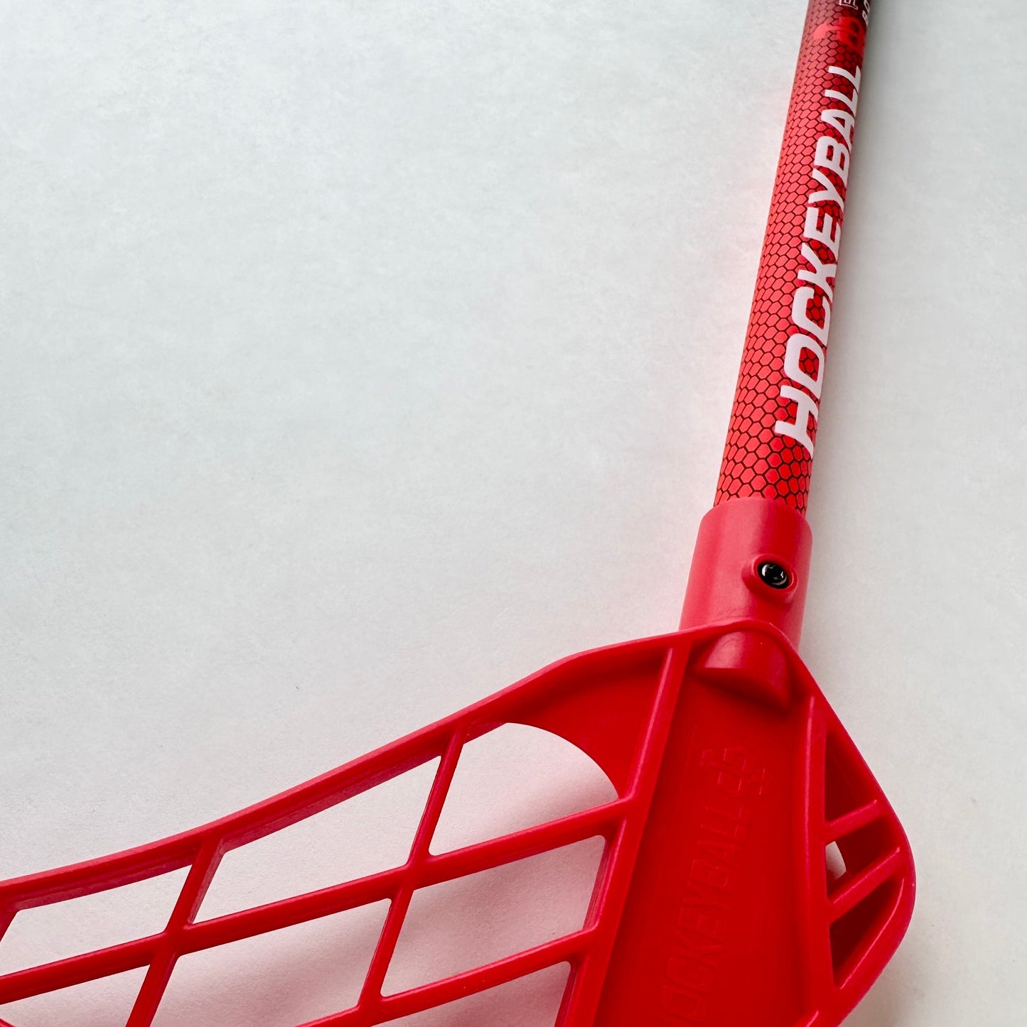 Hockeyball red stick close up